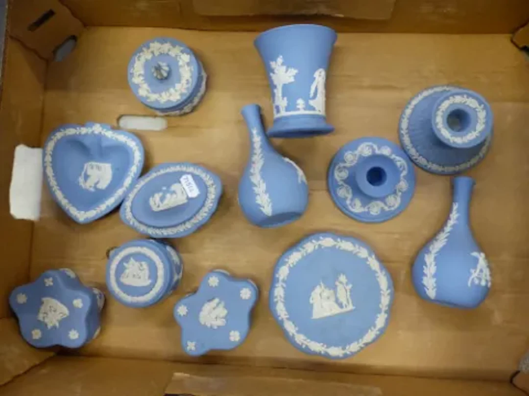 Wedgwood powder blue jasper ware to include lidded boxes, vases, squat