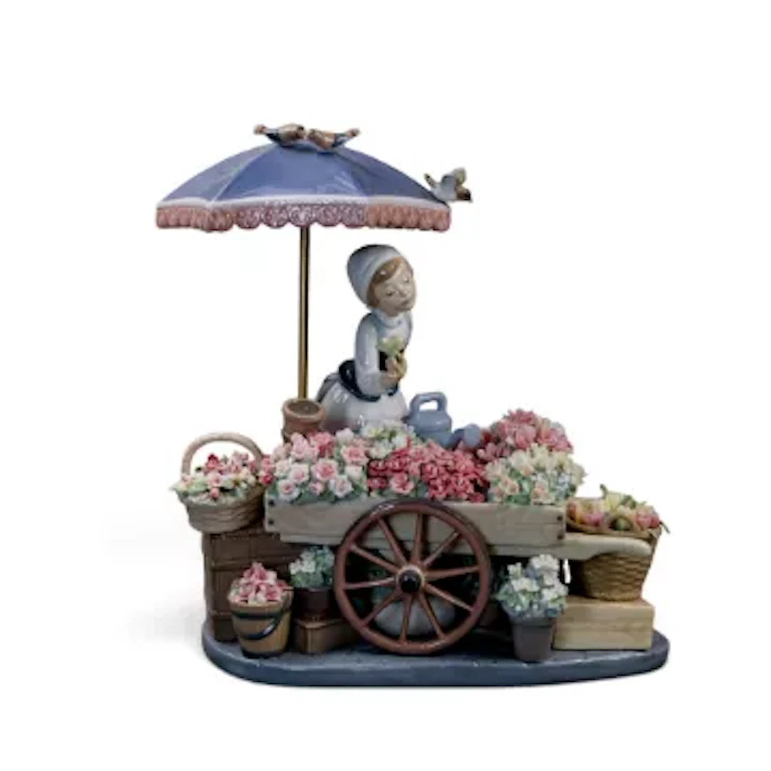 A Lladro prestige porcelain figurine titled 'Flowers of the Season'