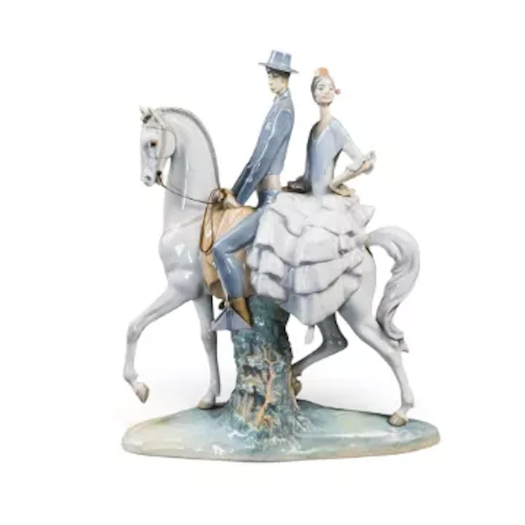 A large Lladro Porcelain figure of a Spanish couple on Andalusian