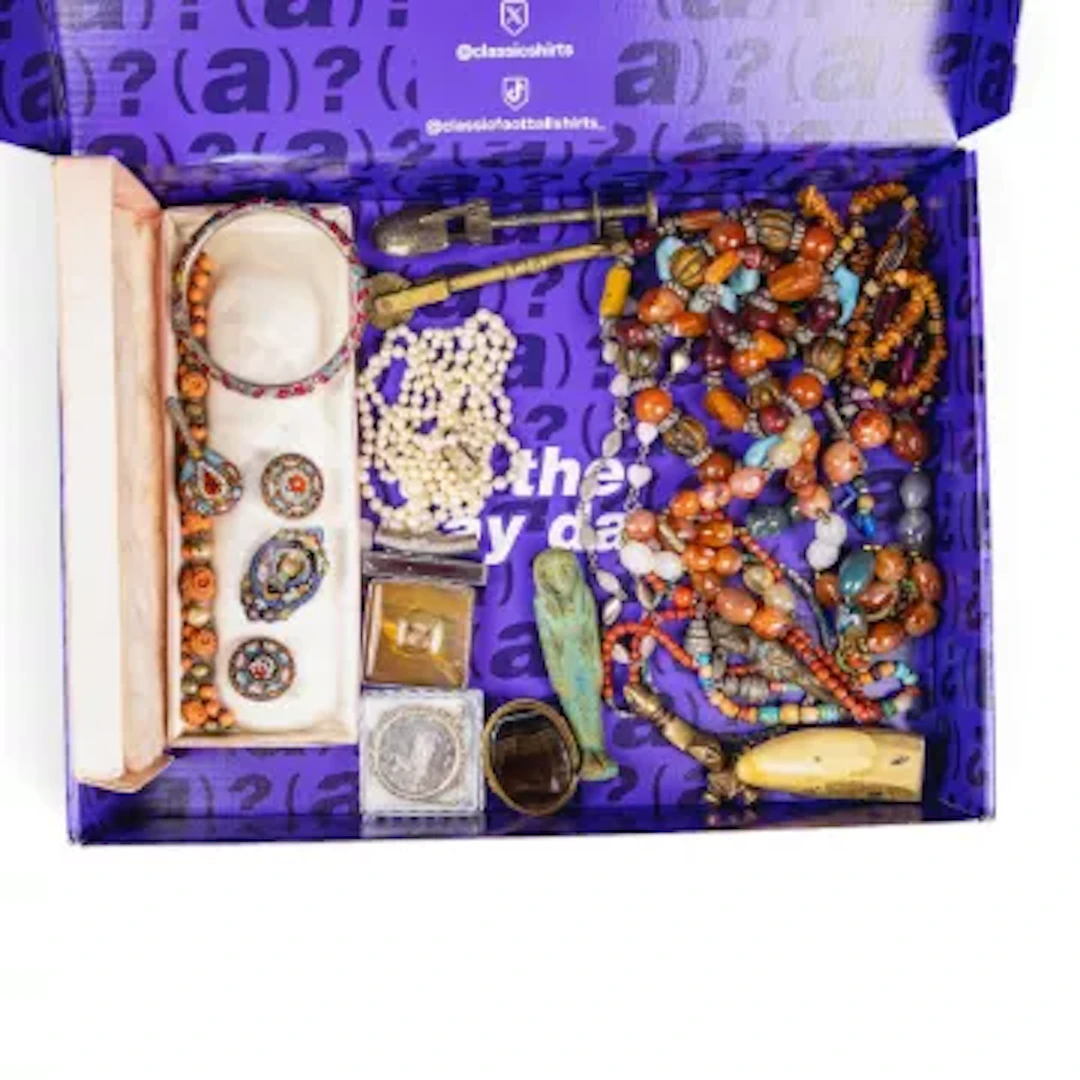 A good collection of antique costume jewellery, including coral necklace