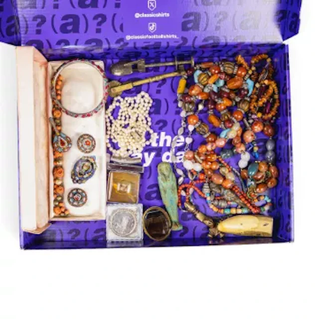 A good collection of antique costume jewellery, including coral necklace