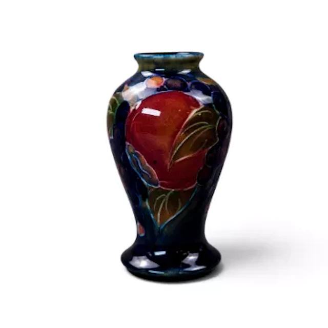 A Moorcroft vase in the Pomegranate pattern, c1913, app h.10cm, designed