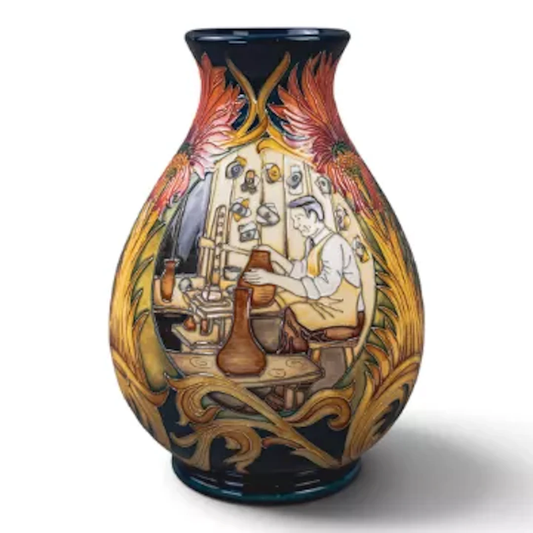 A Moorcroft limited edition vase 'William at Work' design by Paul