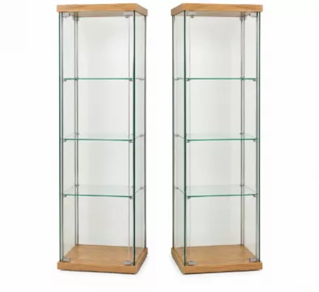 A pair of free standing tall slim display cabinets with light oak