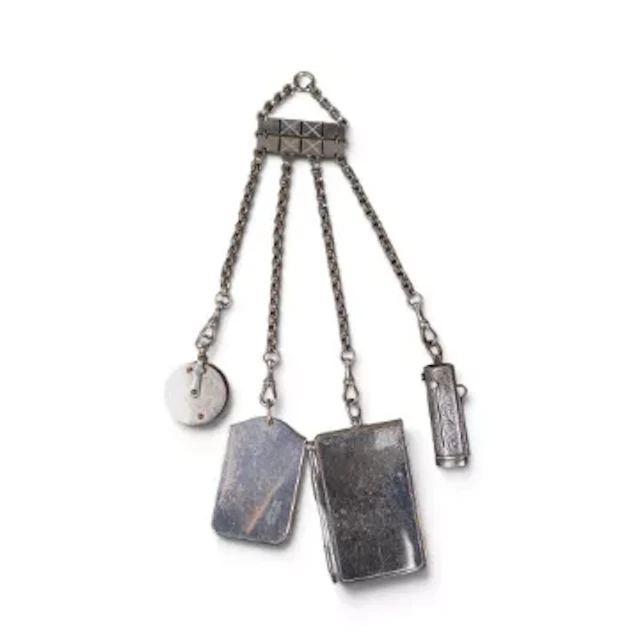 19th century steel chatelaine with a variety of interesting devices attached.