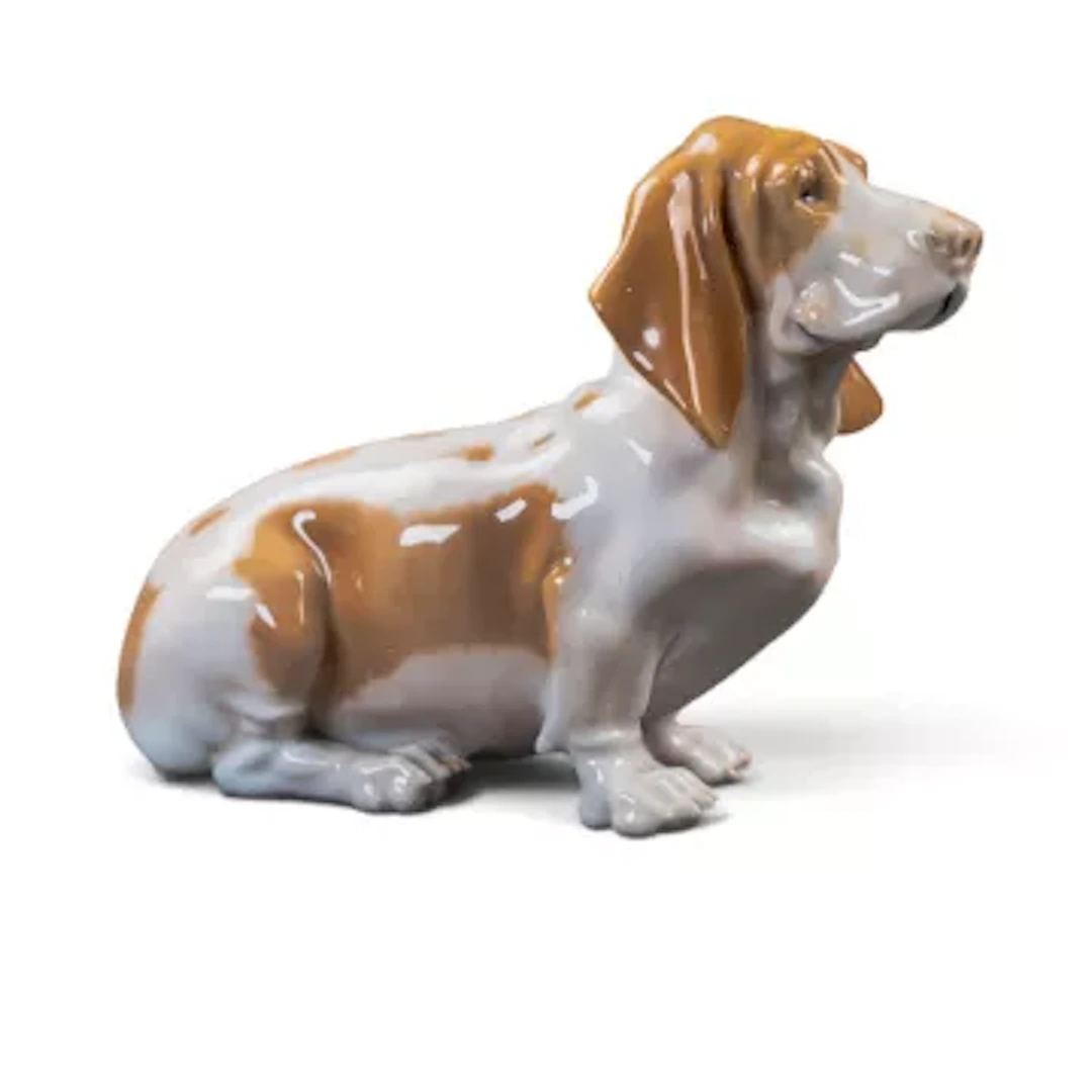 A Royal Copenhagen figure of a basset hound model number 4616, h.11.5cm