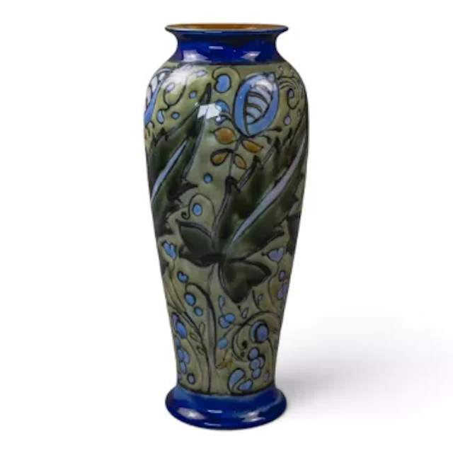 A Doulton Lambeth vase with a hand painted floral design against a