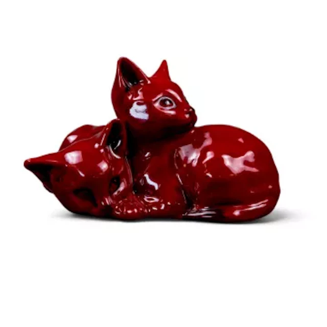 A Royal Doulton flambe Siamese Kittens group, model number 1296, h.6.5cm.