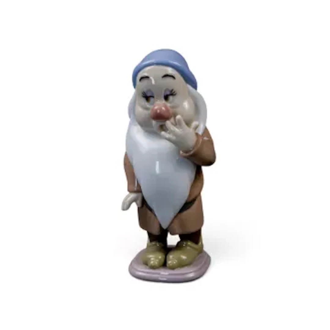 A Lladro Disney figure, 'Sleepy' from Snow White and the Seven Dwarfs