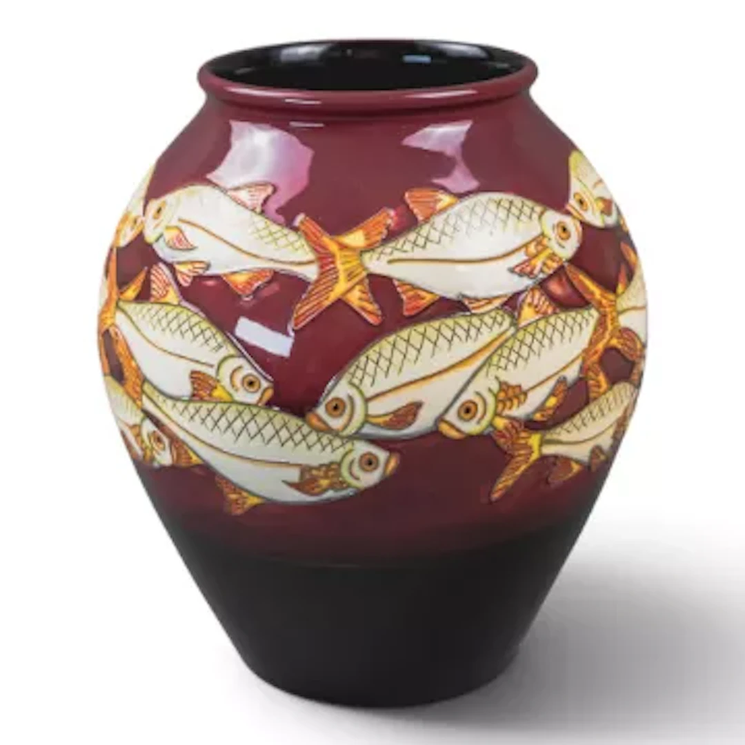 A Moorcroft limited edition fish design vase designed by Helen Dale