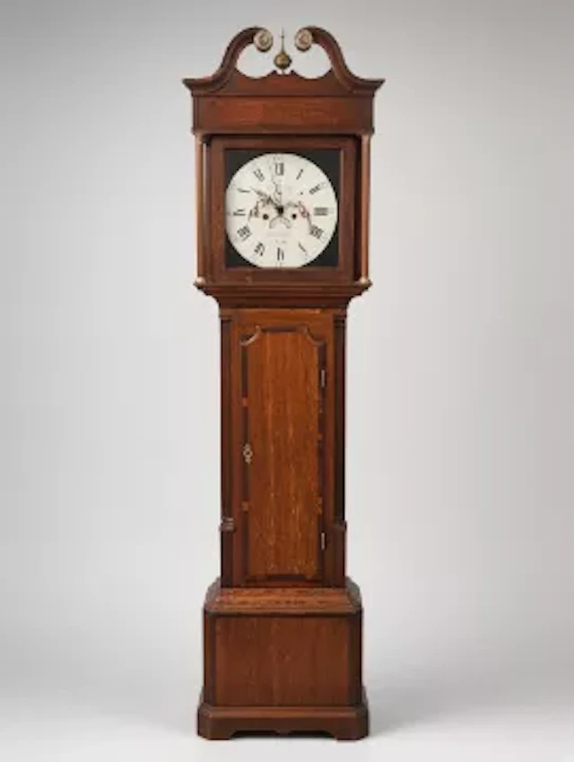A George lll style oak longcase clock by Thomas Ashton of Leeds. Height 213cm.