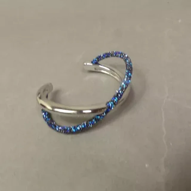 SWAROVSKI Crystal rhodium plated crystaldust blue cuff bangle, unworn