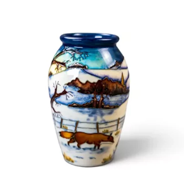A Moorcroft vase in the Woodside Farm design by Anji Davenport, signed