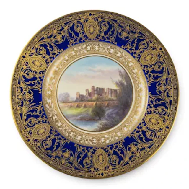A Royal Worcester plate decorated with landscape scene of Kenilworth