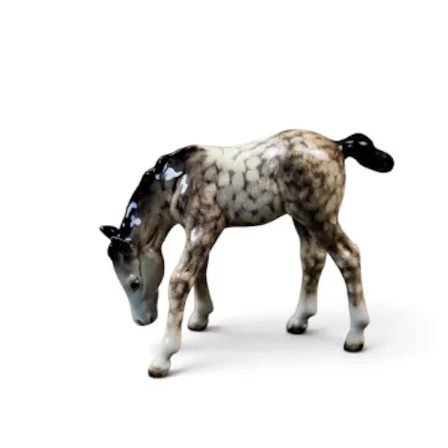 A Beswick Grazing Foal in Rocking Horse Grey, model number 946, h.8.5cm