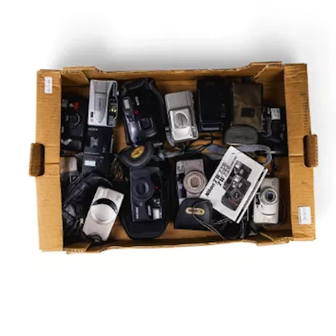 A good collection of 35mm film cameras including Canon Z115, Pentax