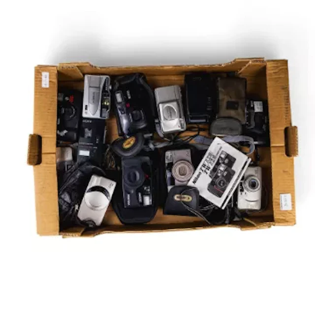 A good collection of 35mm film cameras including Canon Z115, Pentax