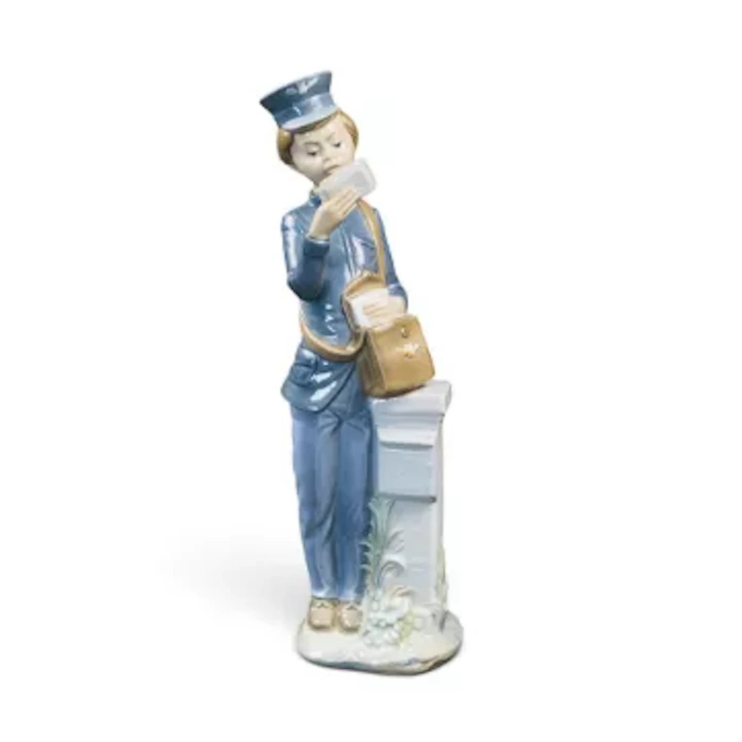 Nao by Lladro Porcelain figure 'Mailman/Postman' model no.0233 depicting