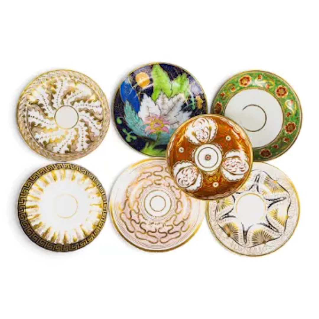 Seven English porcelain shallow dishes by various manufacturers, in