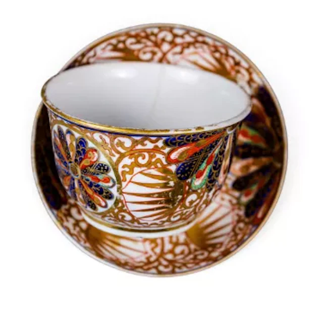 A 19th century English porcelain part service decorated with the Fan