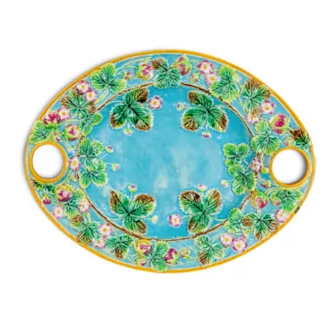 A large oval shaped Majolica serving tray, with wells for preserve