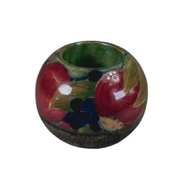 William Moorcroft early Pomegranate Vesta on green ground c.1913, h.6.5cm.