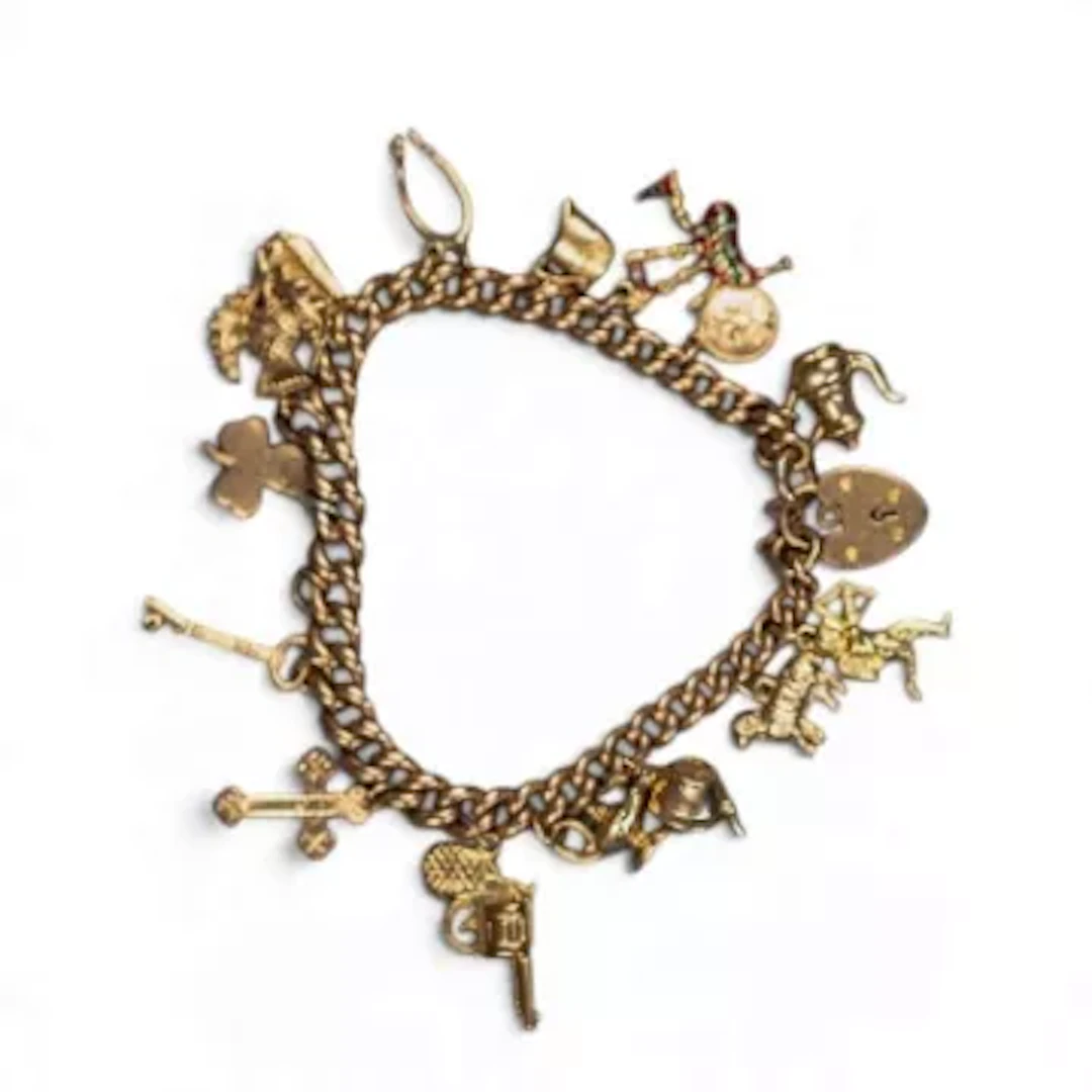 9ct gold charm bracelet, with 15 x 9ct gold charms, 37.7g.