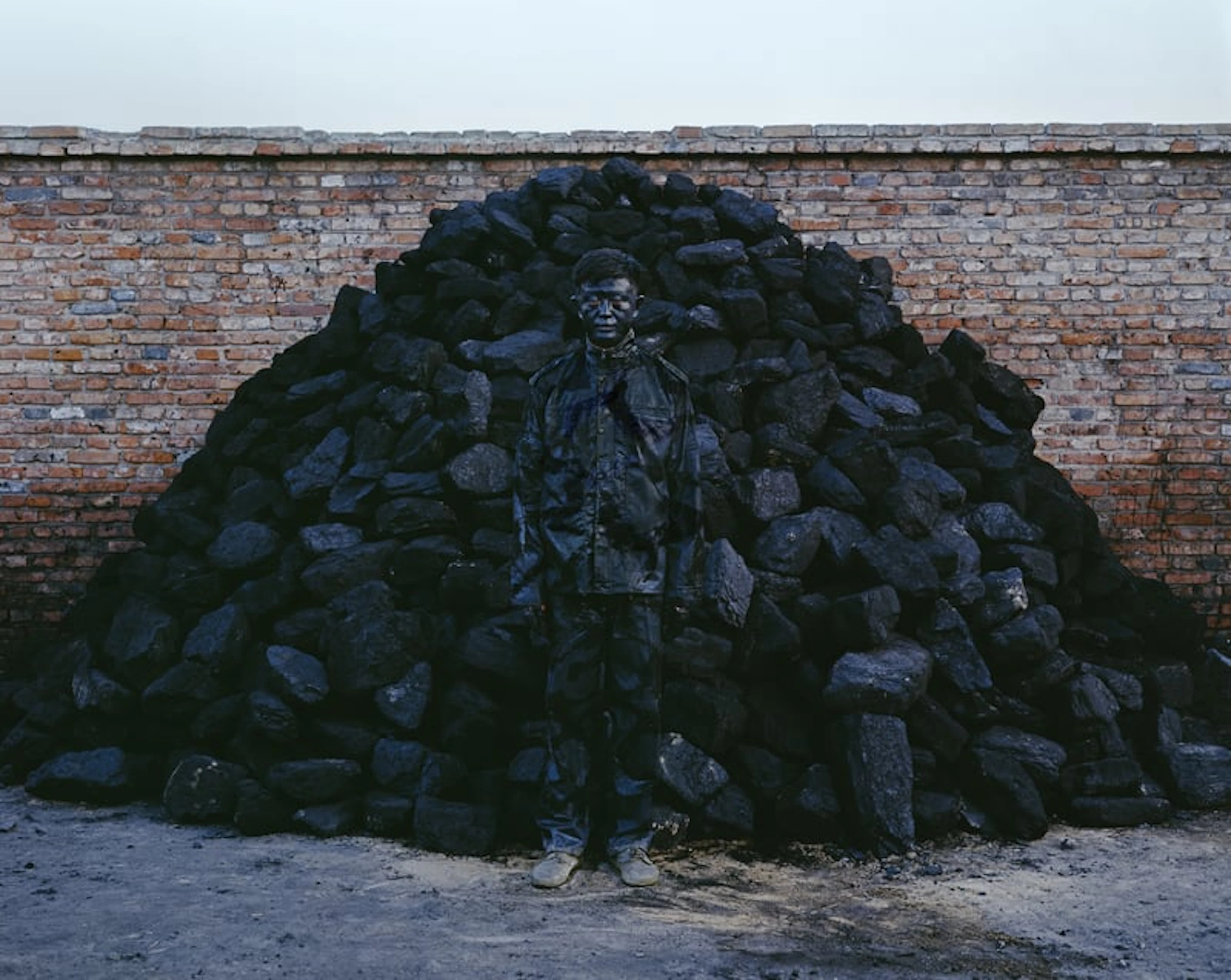 Liu Bolin - Contemporary Photographer - Hiding in the City No. 95 - Coal Pile