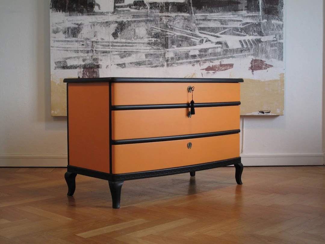 LIKNANDE KAN BESTÄLLAS – ART DECÓ SVART/ HERMÉS-ORANGE