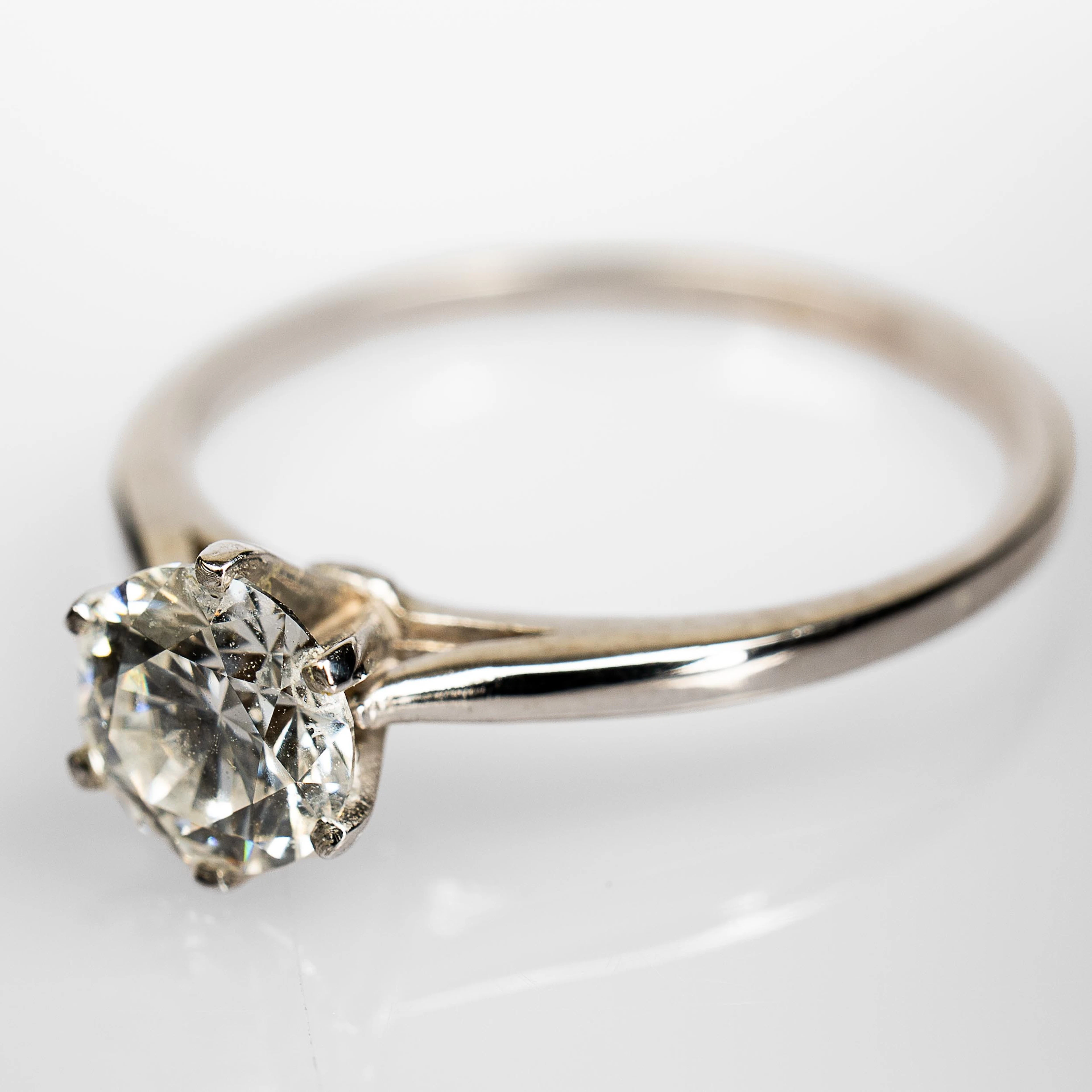 ENSTENSRING. 14K Guld med briljantslipad diamant 1,02 ct.