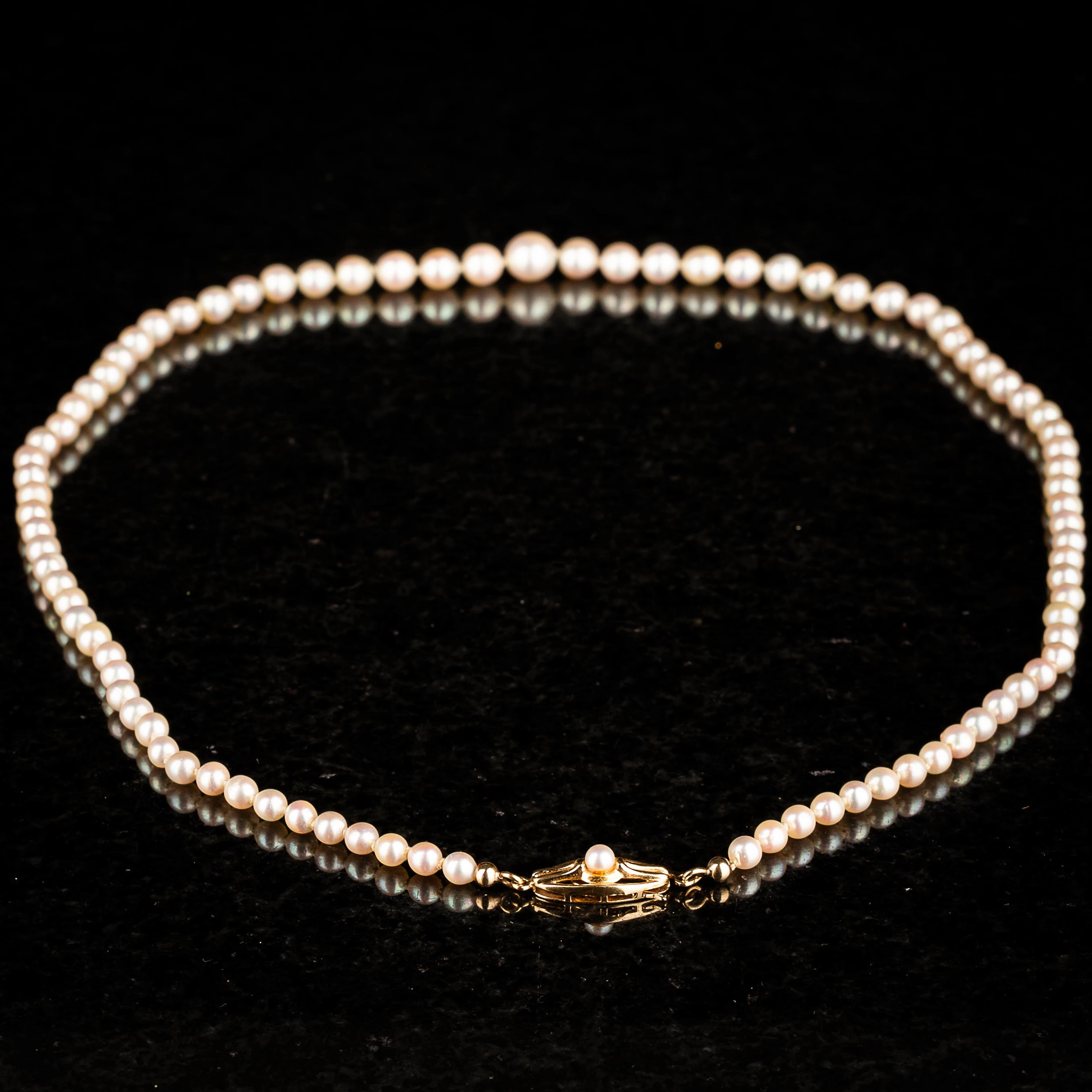PÄRLCOLLIER, Spänne i 18k guld.