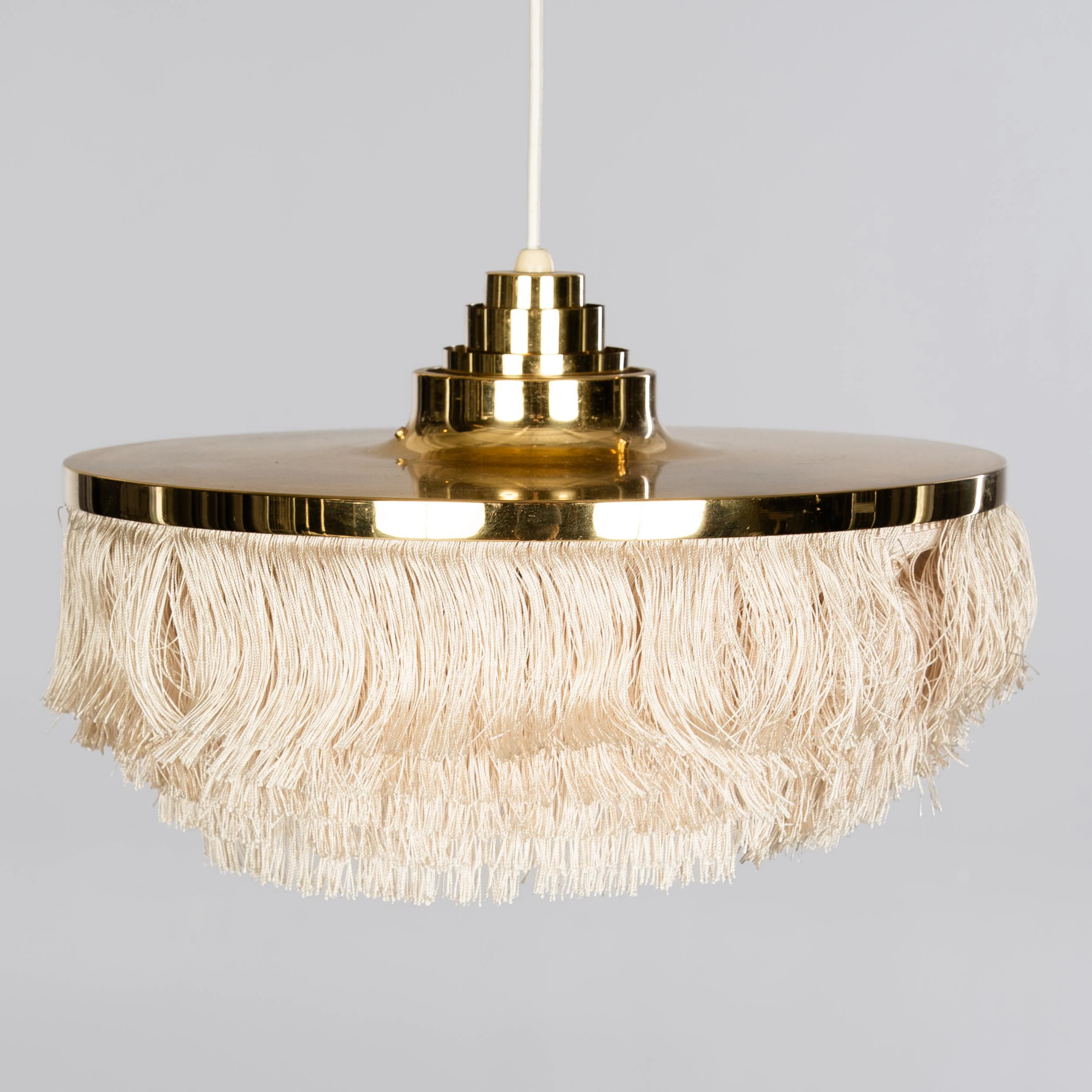 HANS-AGNE JAKOBSSON. Taklampa, mässing och sidenfransar, Markaryd, 1960/70-tal.