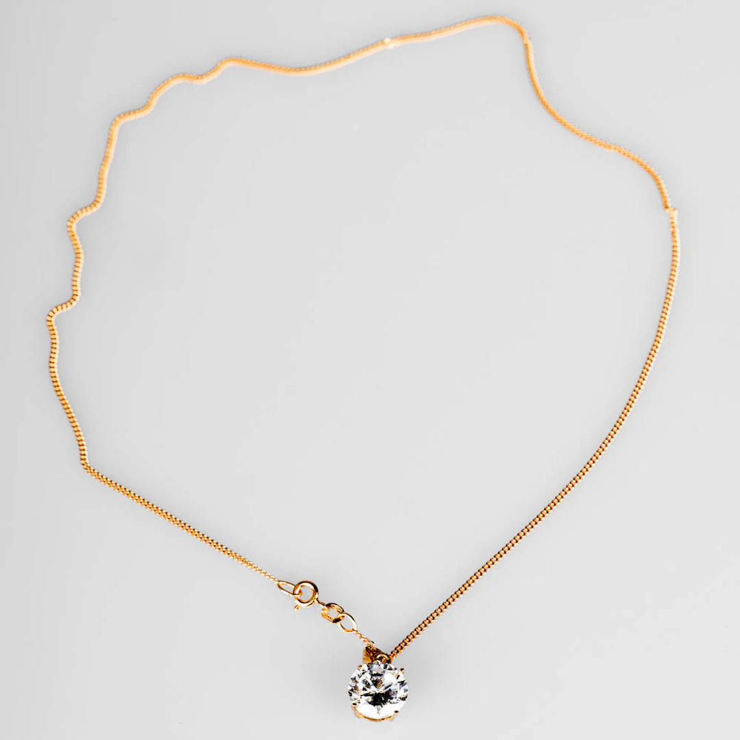 HALSBAND / KEDJA. 18K Guld med kubisk zirkon 1900-tal.