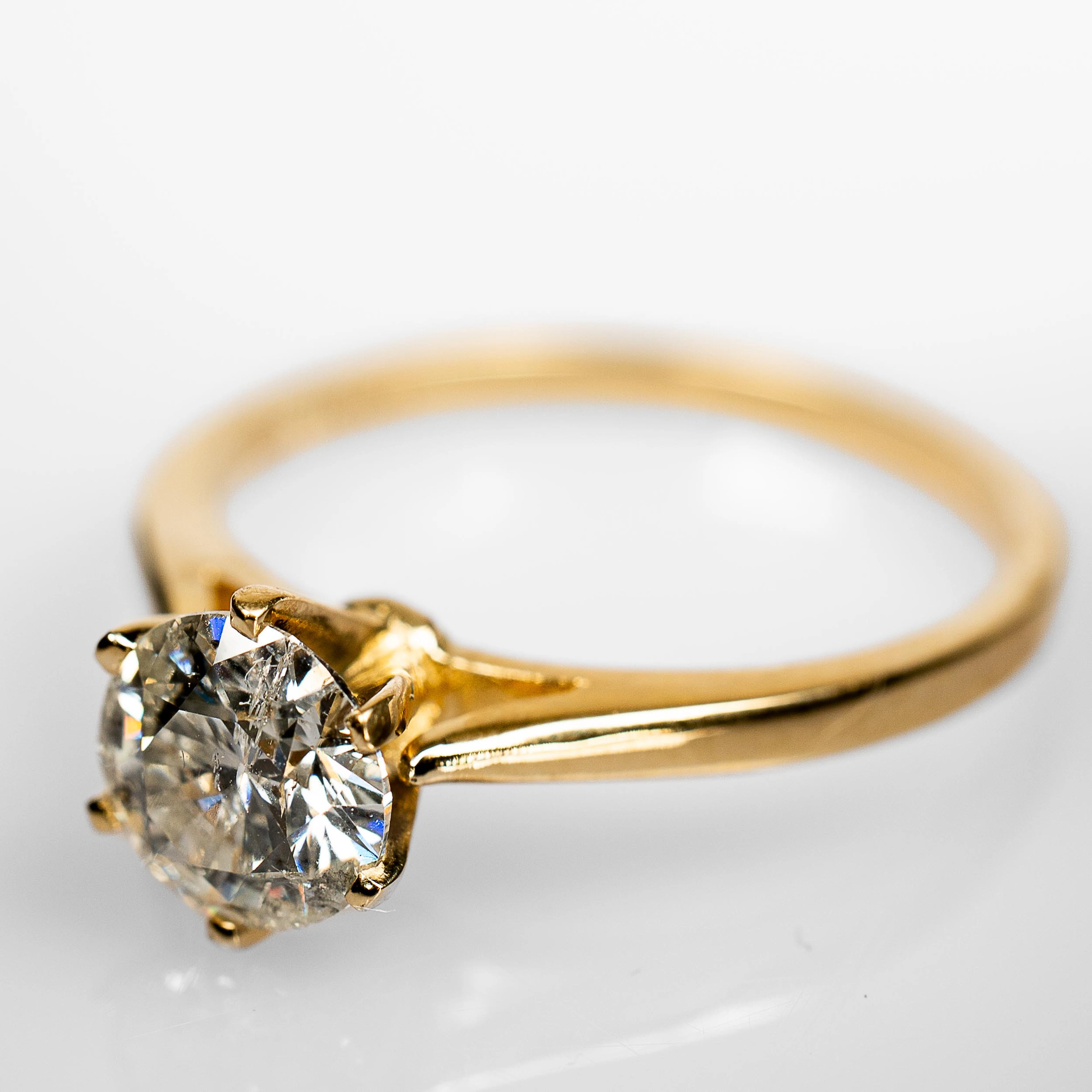 ENSTENSRING. 14K Guld med briljantslipad diamant 1,0 ct.