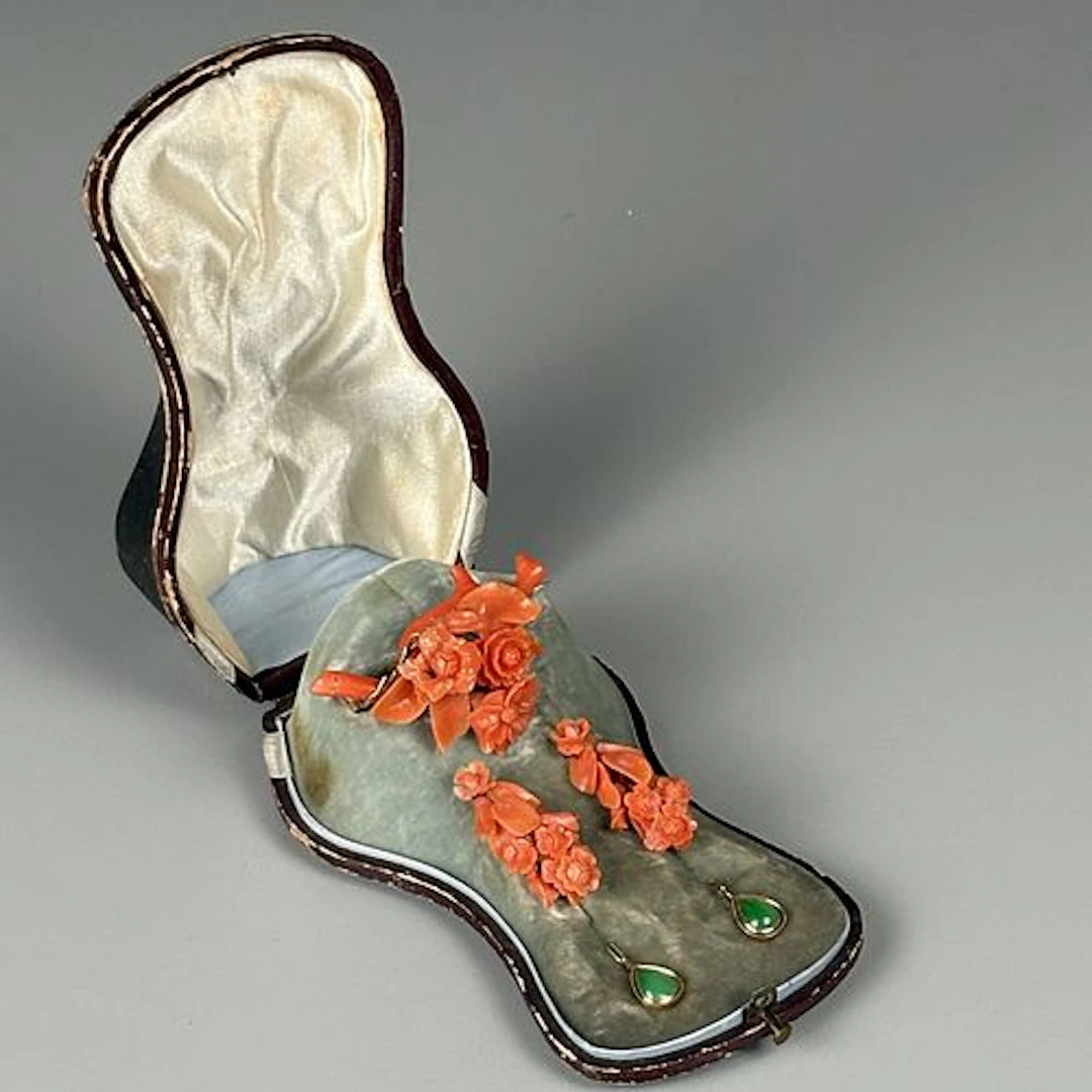A Victorian Carved Coral Floral Brooch and Earrings
