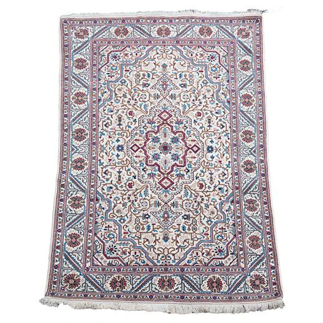 A Persian Silk and Wool Rug