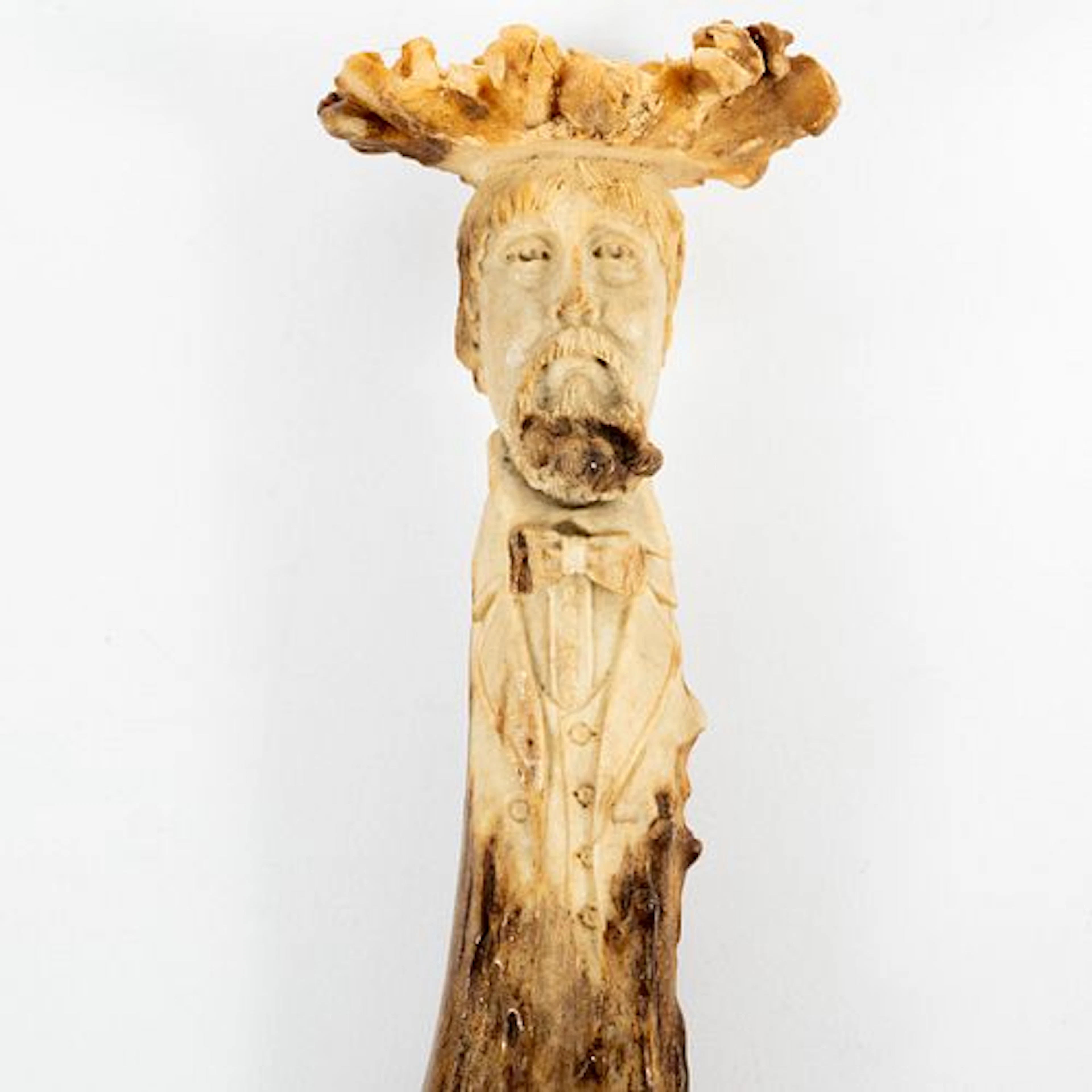 A Folk Art Hand Carved Antler Letter Opener