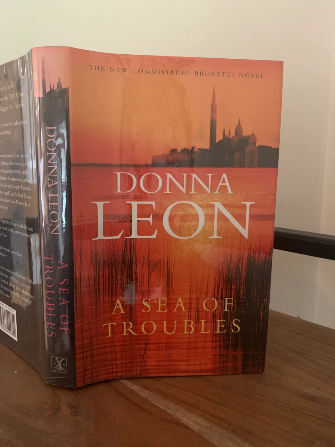 [Signed] [First Edition] A Sea of Troubles (signed) Leon