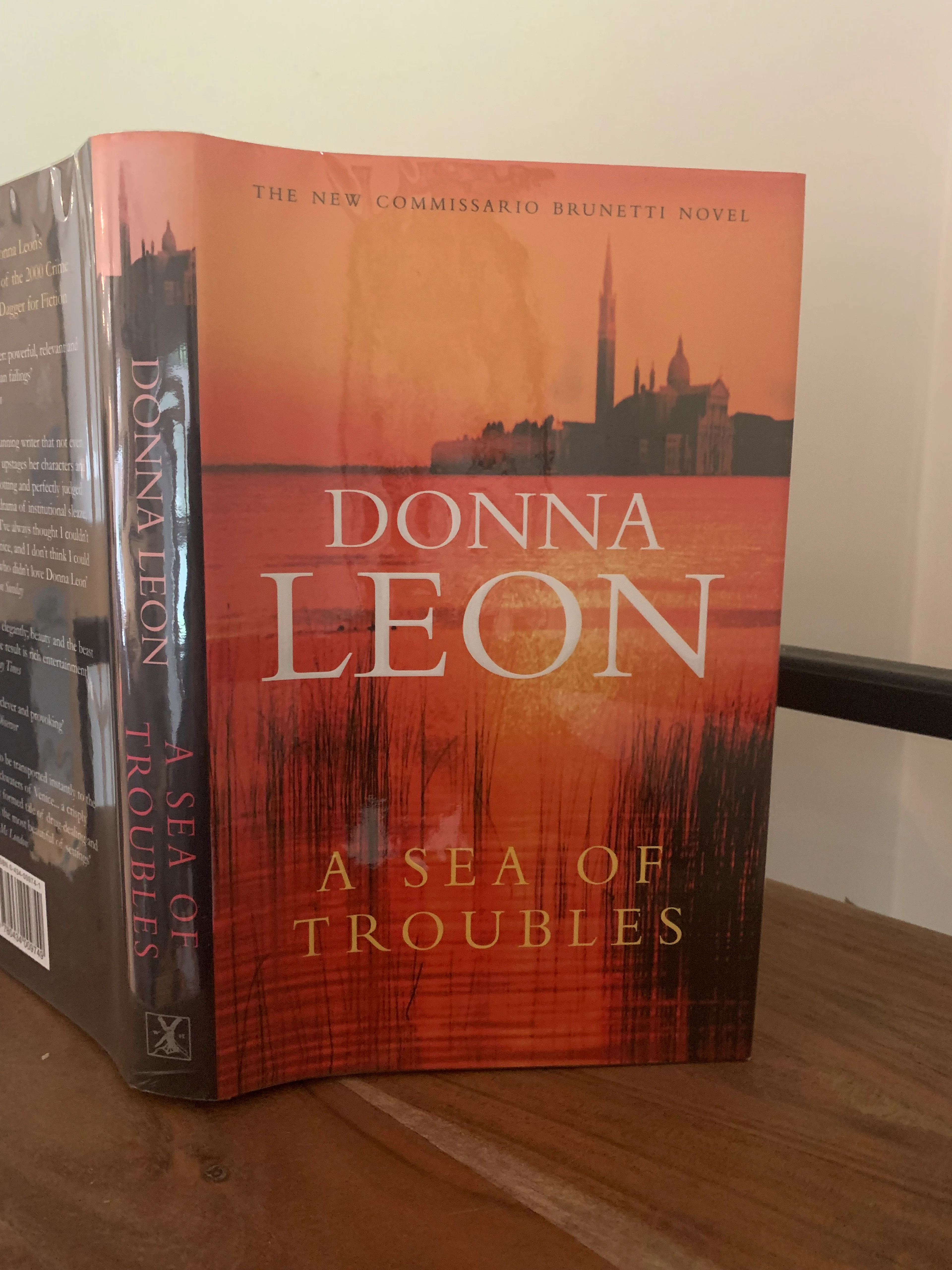 [Signed] [First Edition] A Sea of Troubles (signed) Leon