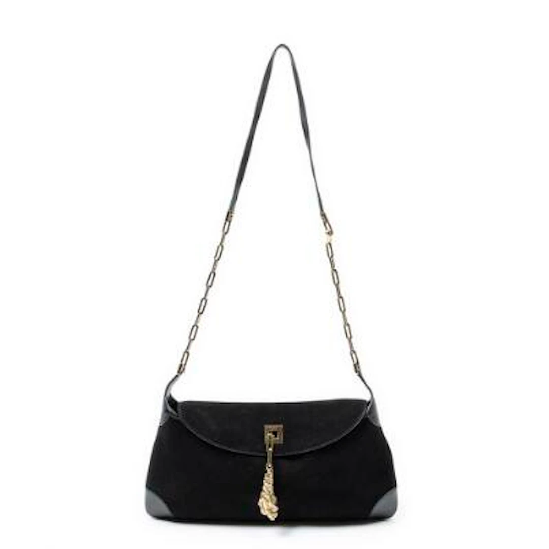 Gucci: A "Tiger Charm Chain Flap" bag in black suede with black leather