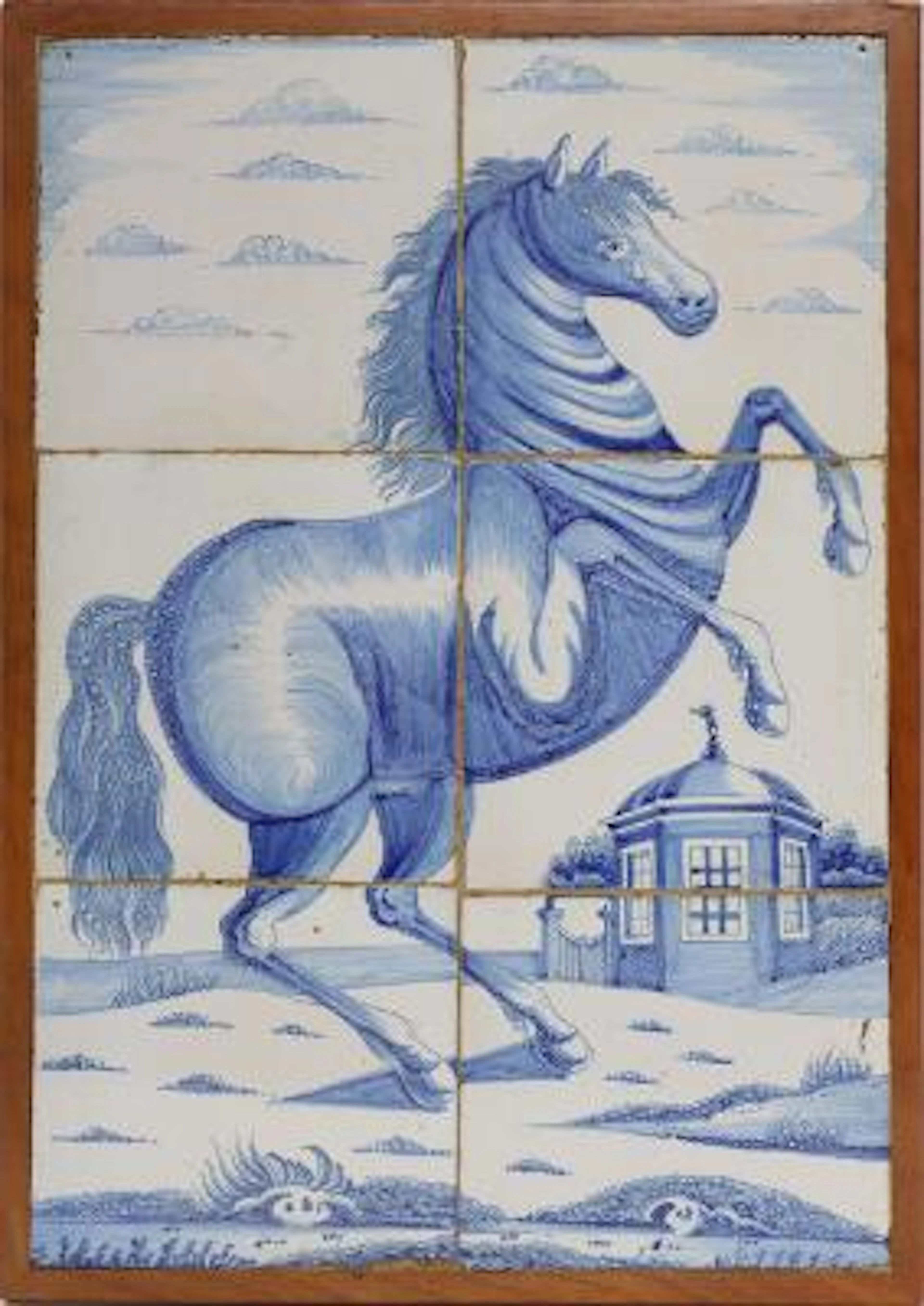 Dutch faience tile picture, decorated in blue with rearing stallion.