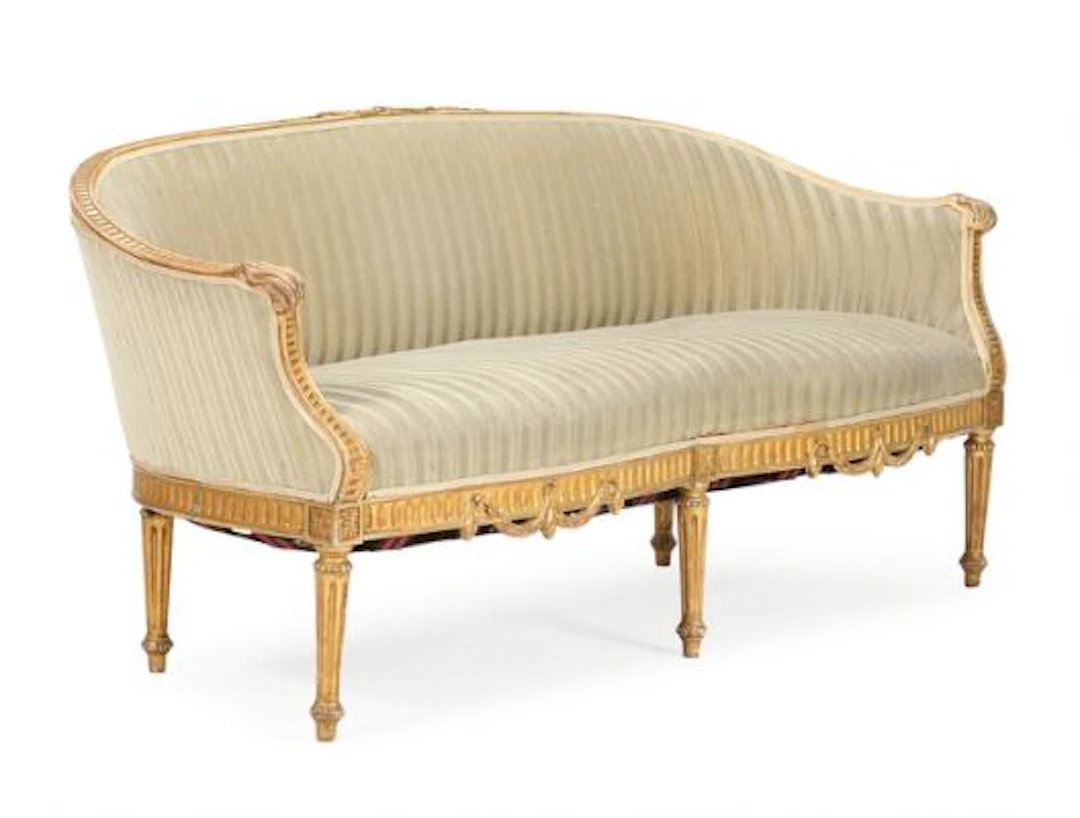 A 19th century Danish Louis XVI giltwood sofa, with curved back and