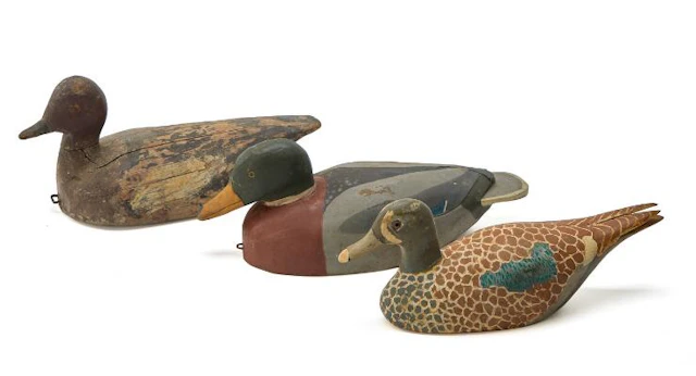 Unknown artists: Three various carved and painted wooden decoys. L.