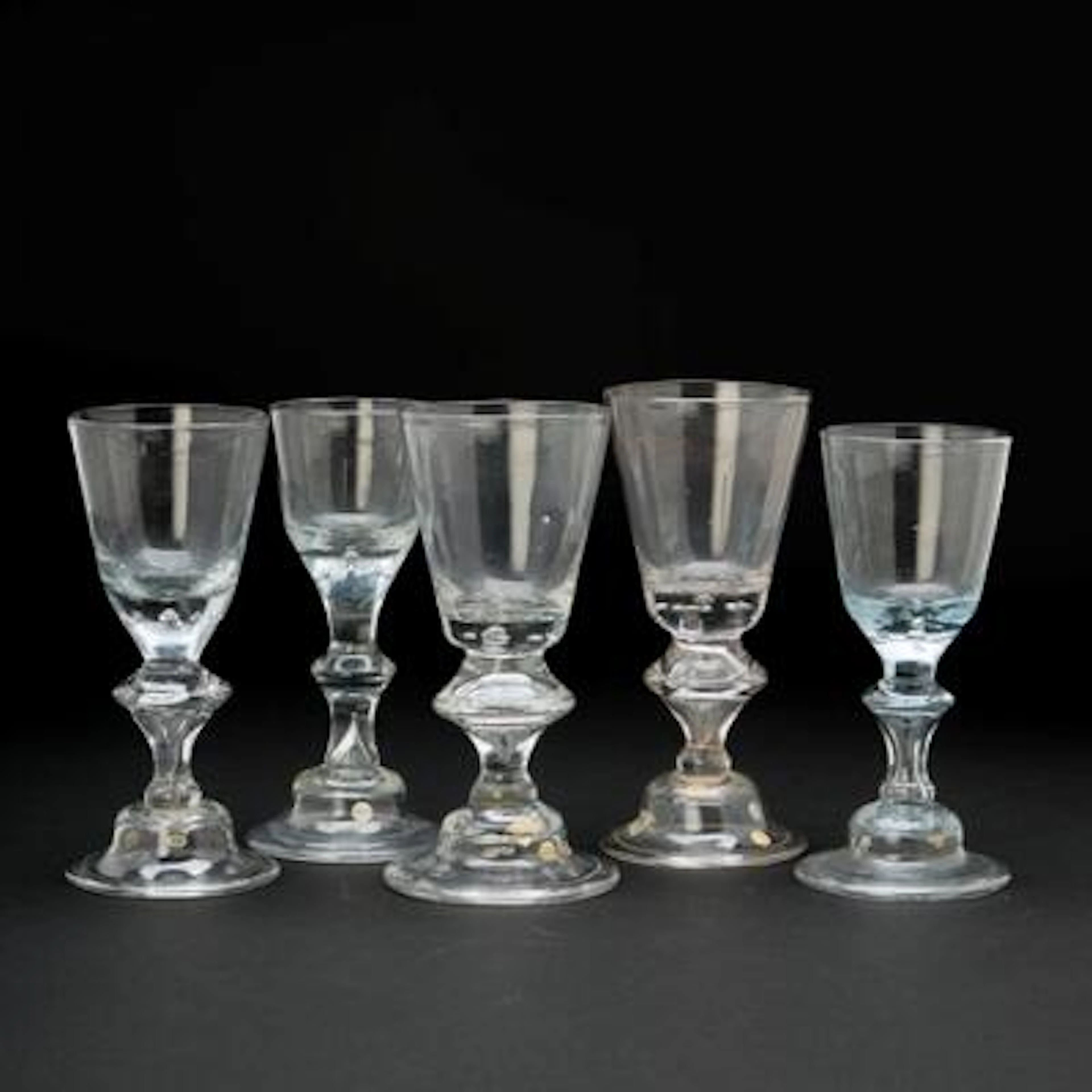 Five German Perlkelchen wine glasses. 18th century. H. 17-18 cm. (5)