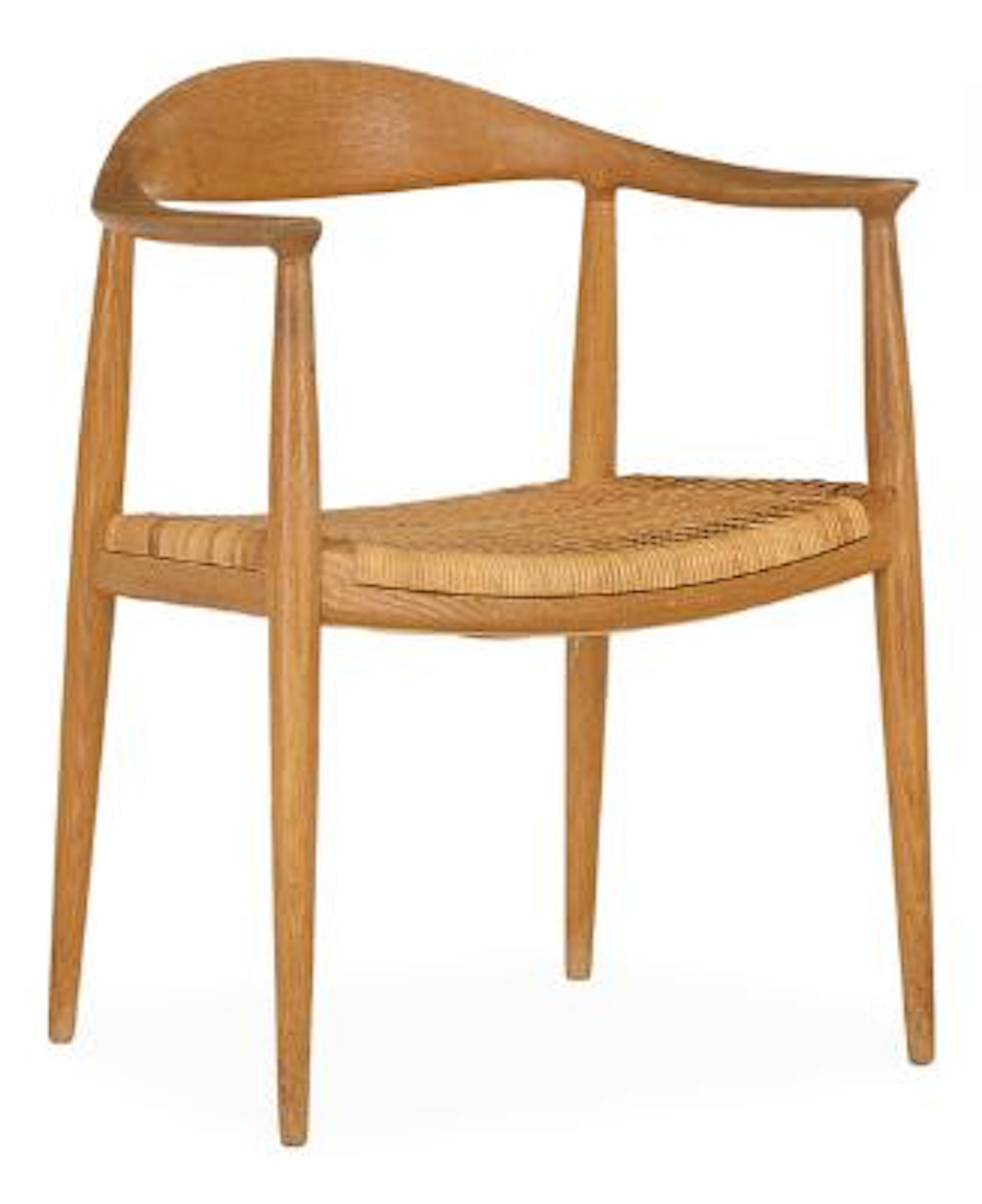 Hans J. Wegner: “The Chair”. Oak armchair. Seat with woven cane. Model