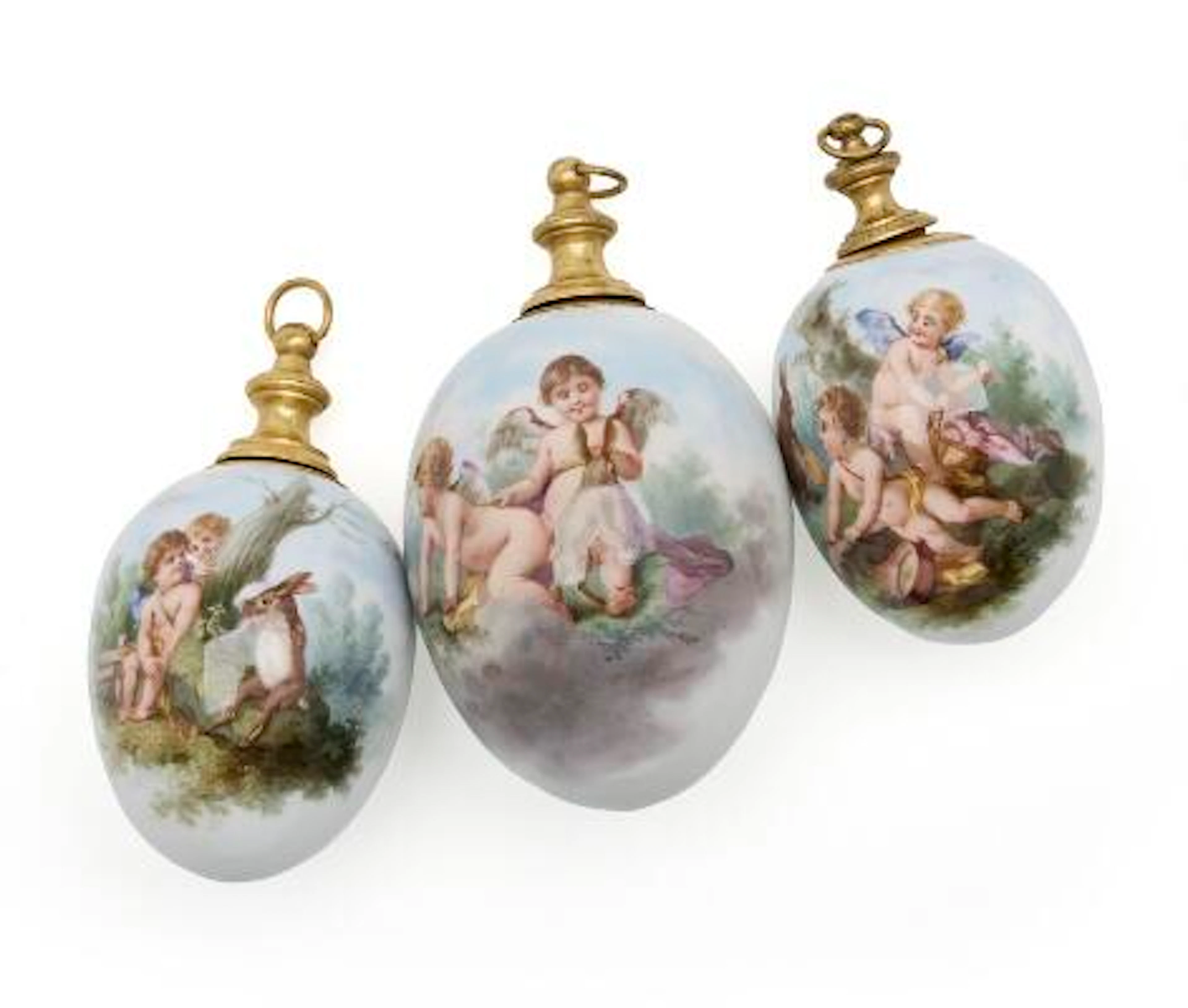 Three German porcelain perfume bottle eggs. The Royal Porcelain Factory