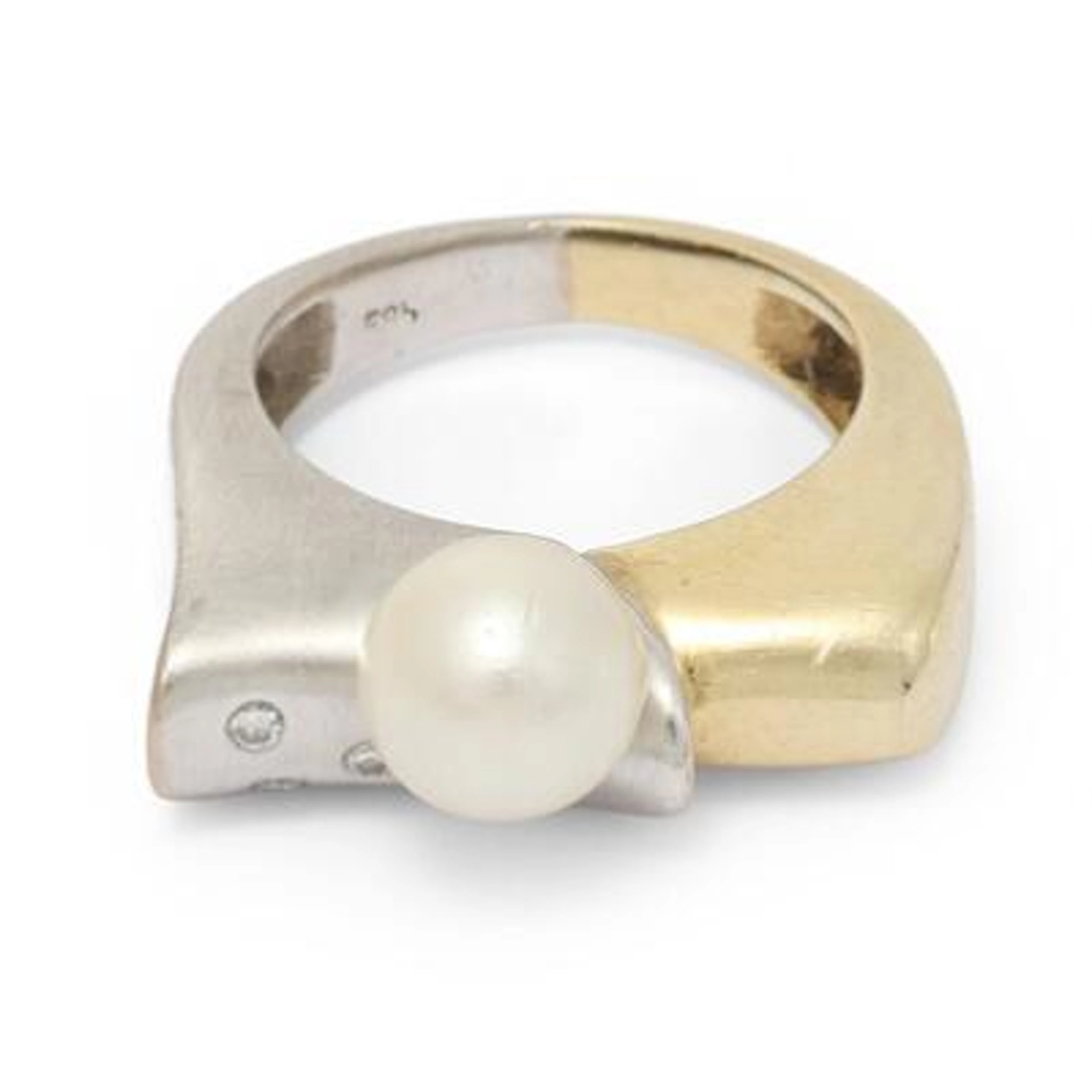 A pearl and diamond ring set with a pearl and diamonds mounted 14k