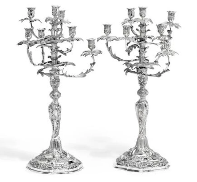 A. Michelsen: A pair of Danish Rococo Revival seven-light silver candelabra.