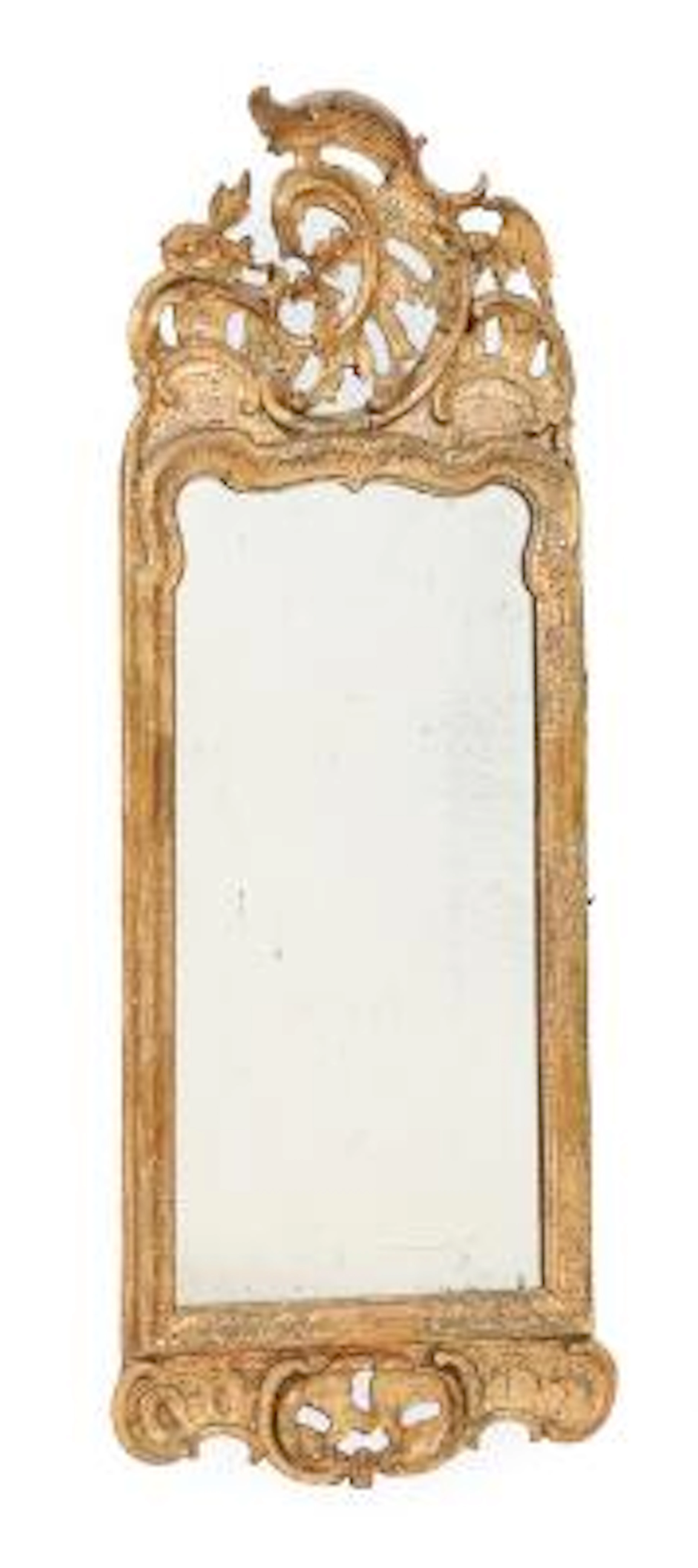 Rococo mirror of gilded wood and gesso, carved with rocailles, combs
