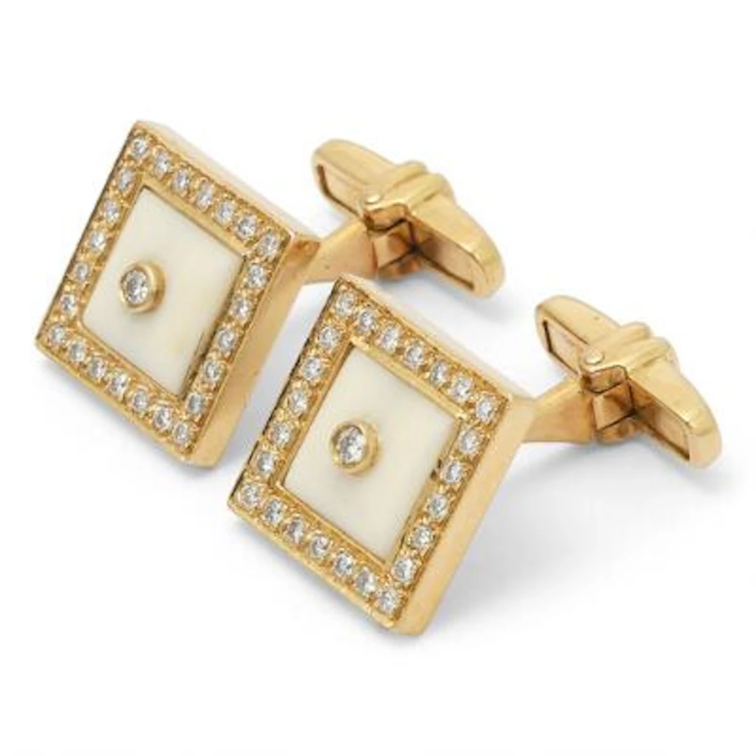 A pair of diamond and enamel cufflinks of 18k gold. Front 14 x 14